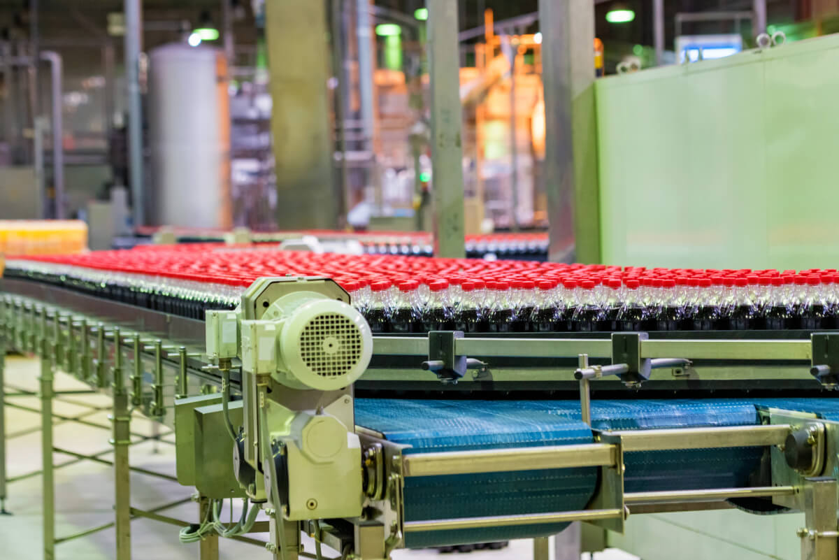 view-of-plastic-bottles-at-bottling-line-at-soft-d-2024-10-18-04-29-00-utc (1)